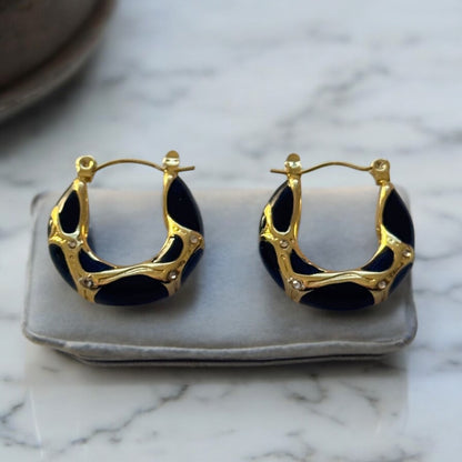 Gold/black steel earrings with zircon-ea091