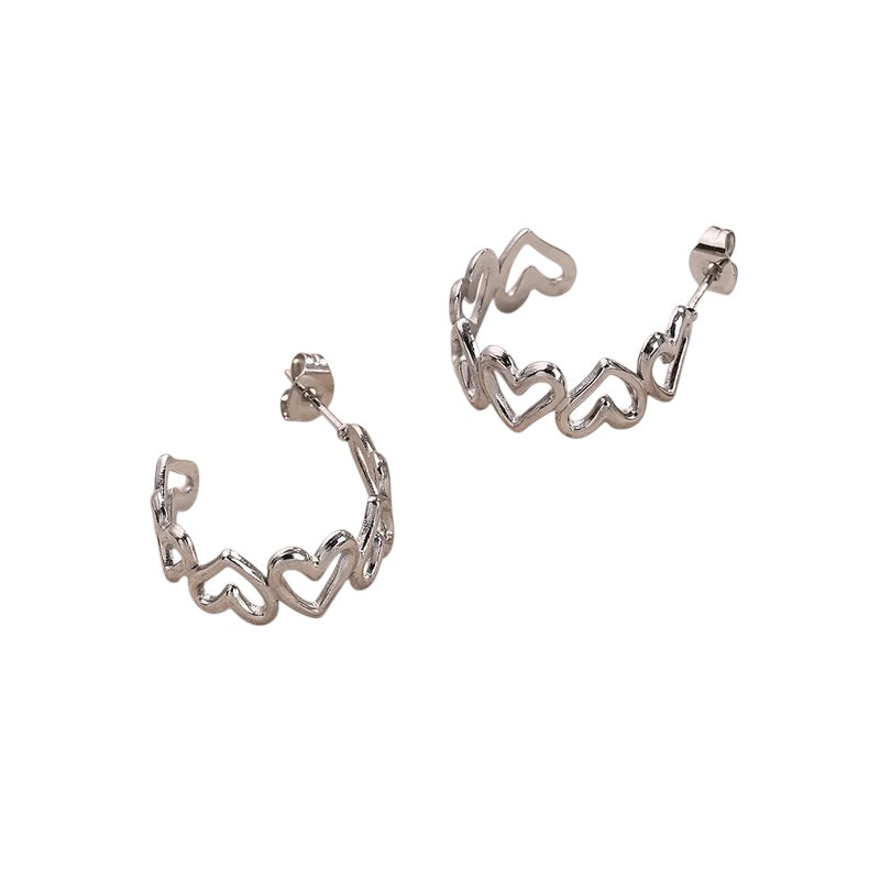 Σκουλαρίκια ατσάλινα ασημί με καρδιές- w587
