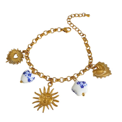 Βραχιόλι ατσάλινο με ήλιο και charms- BR400