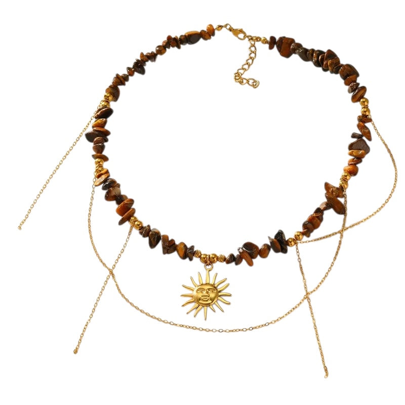 Collar de acero con piedras marrones y sol - NE667
