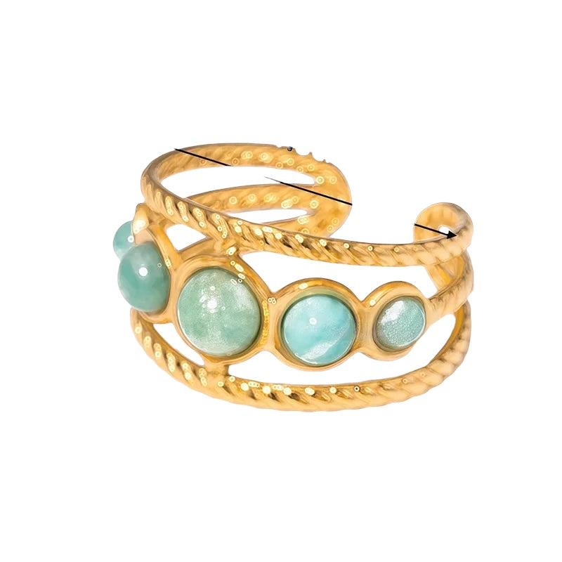 Anillo de acero con piedras verdes - R218