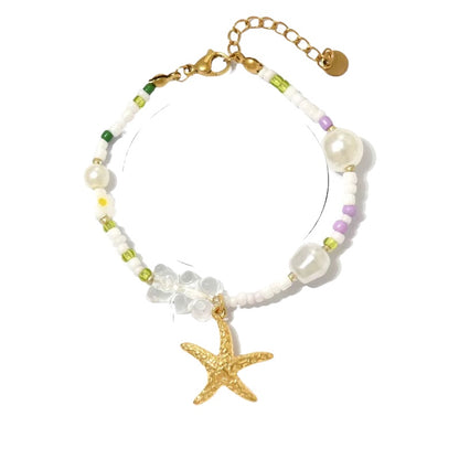 Steel bracelet with white flowers - BR255
