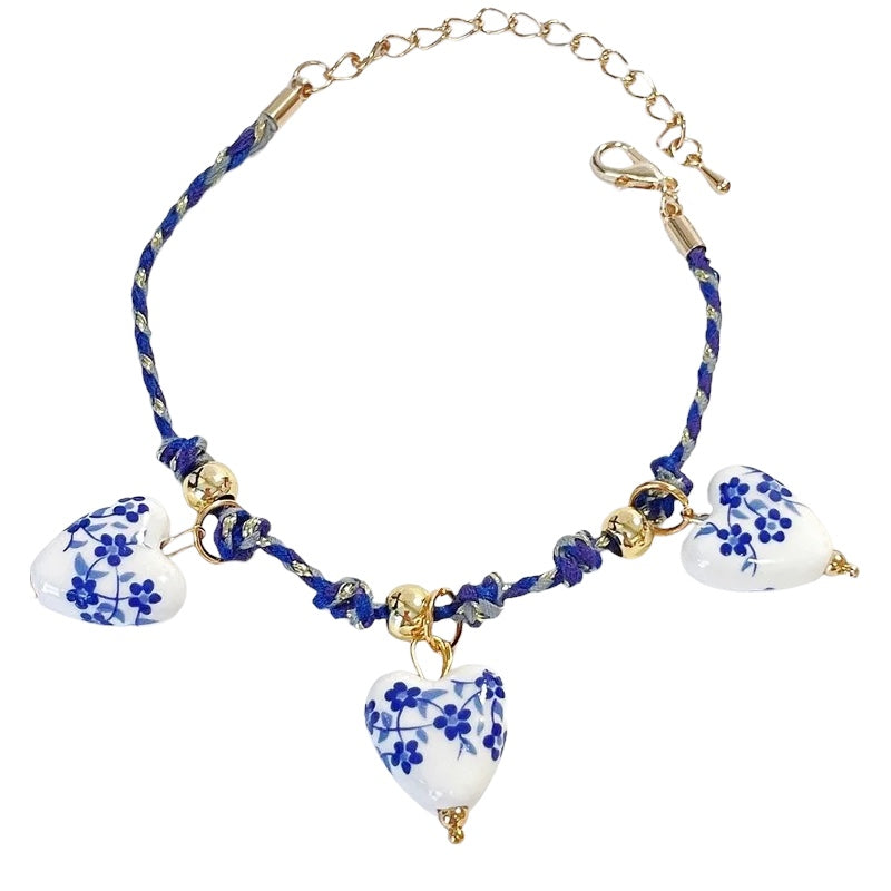 Steel bracelet with white flowers - BR255