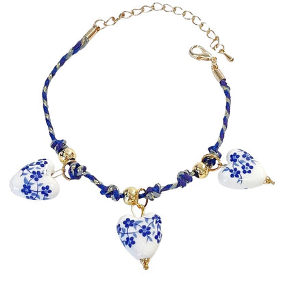 Steel bracelet with white flowers - BR255
