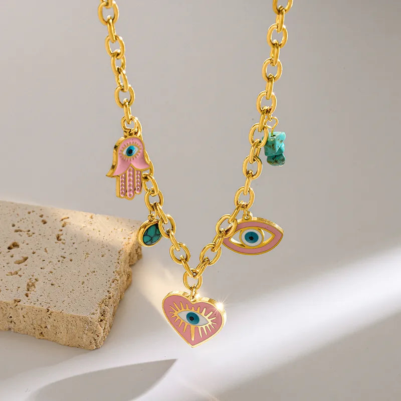 Colier din oțel placat cu aur cu ochi roz-NE034