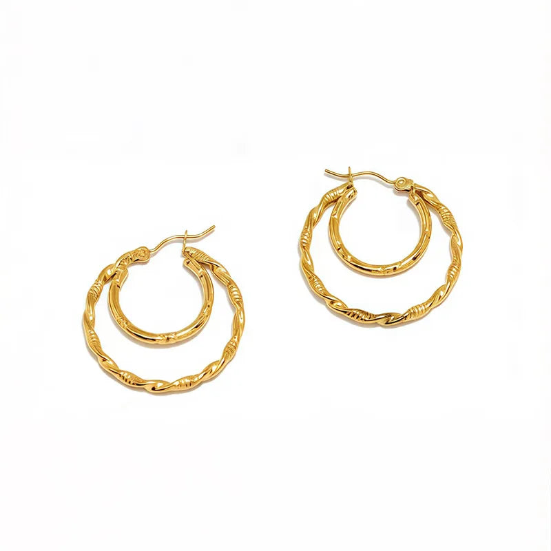 Doppelte Creolen aus Stahl und Gold – EA128