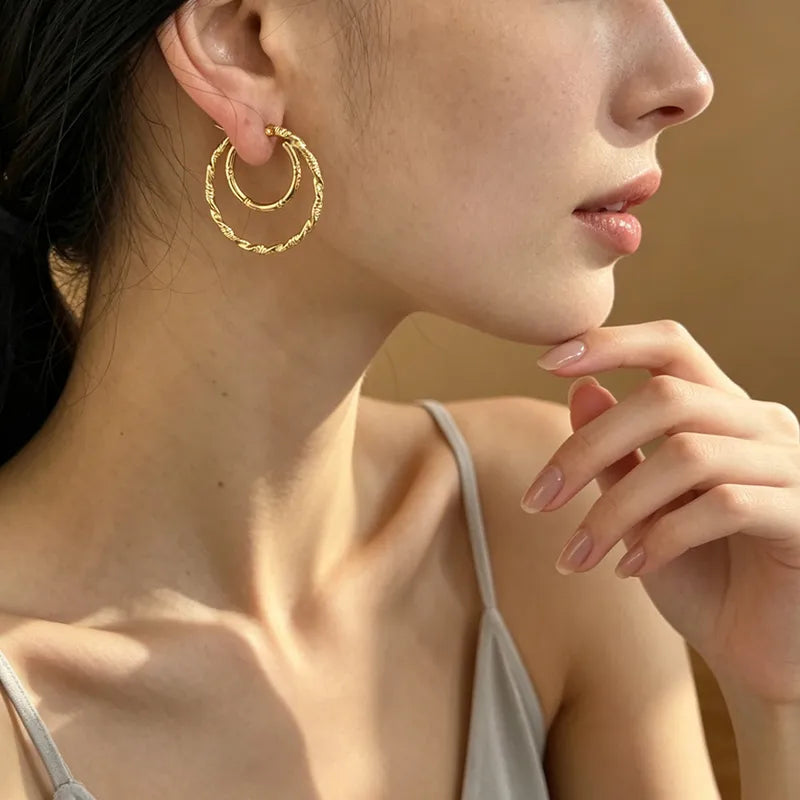 Doppelte Creolen aus Stahl und Gold – EA128