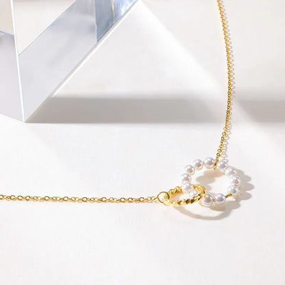 Steel necklace with pink zircon hearts - NE426