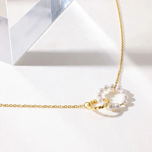 Steel necklace with pink zircon hearts - NE426