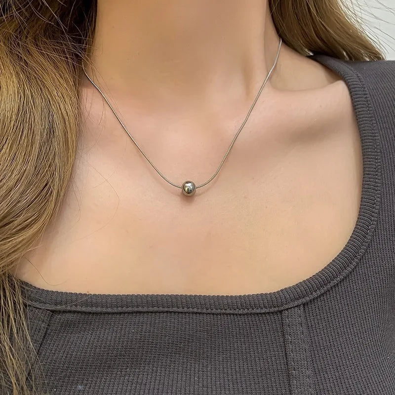 Collar de acero con corazón de resina sintética - NE596