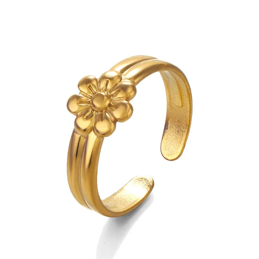 Anello in acciaio dorato con piccolo fiore-R016