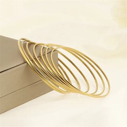 Bracelet gilded steel 7 pieces-br258