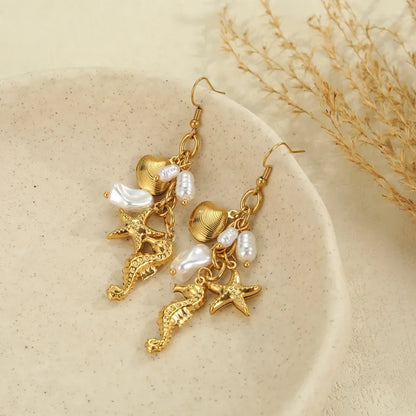 Σκουλαρίκια ατσάλινα με πέρλες και χρυσά στοιχεία - EA759