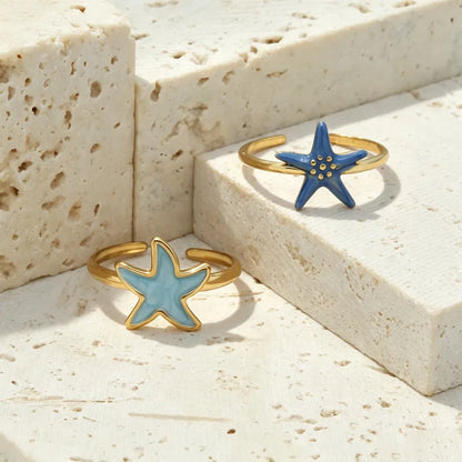 Anillo de acero con cristales verdes- R130