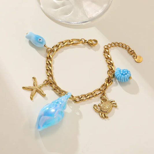Βραχιόλι  ατσάλινο με γαλάζια και χρυσά charms  - BR429
