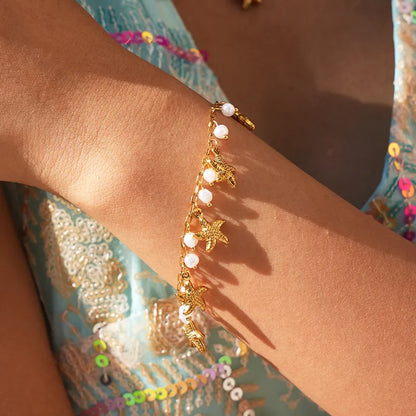 Steel bracelet with white flowers - BR255
