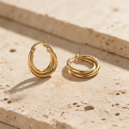 Goldene Stahlohrringe mit braunen Steinen – EA320