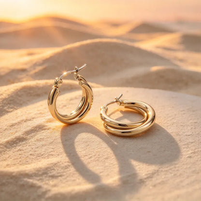 Goldene Stahlohrringe mit braunen Steinen – EA320