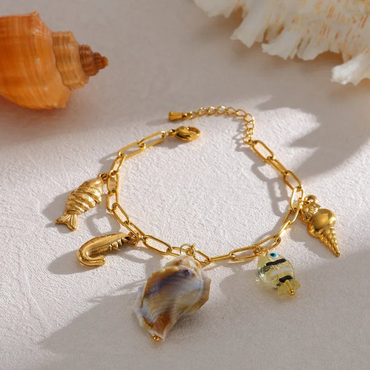 Βραχιόλι ατσάλινο με κοχύλια και ψάρια - br520