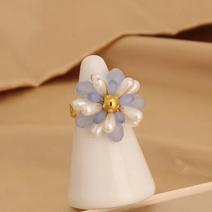 Steel ring with light blue flower - R384