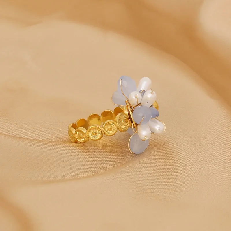 Steel ring with light blue flower - R384