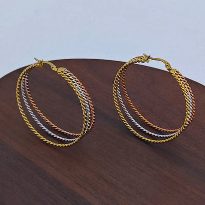 Boucles d'oreilles triple créoles en acier rose, argenté et doré - EA747