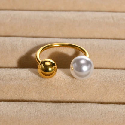Anillo de acero con una perla - R156