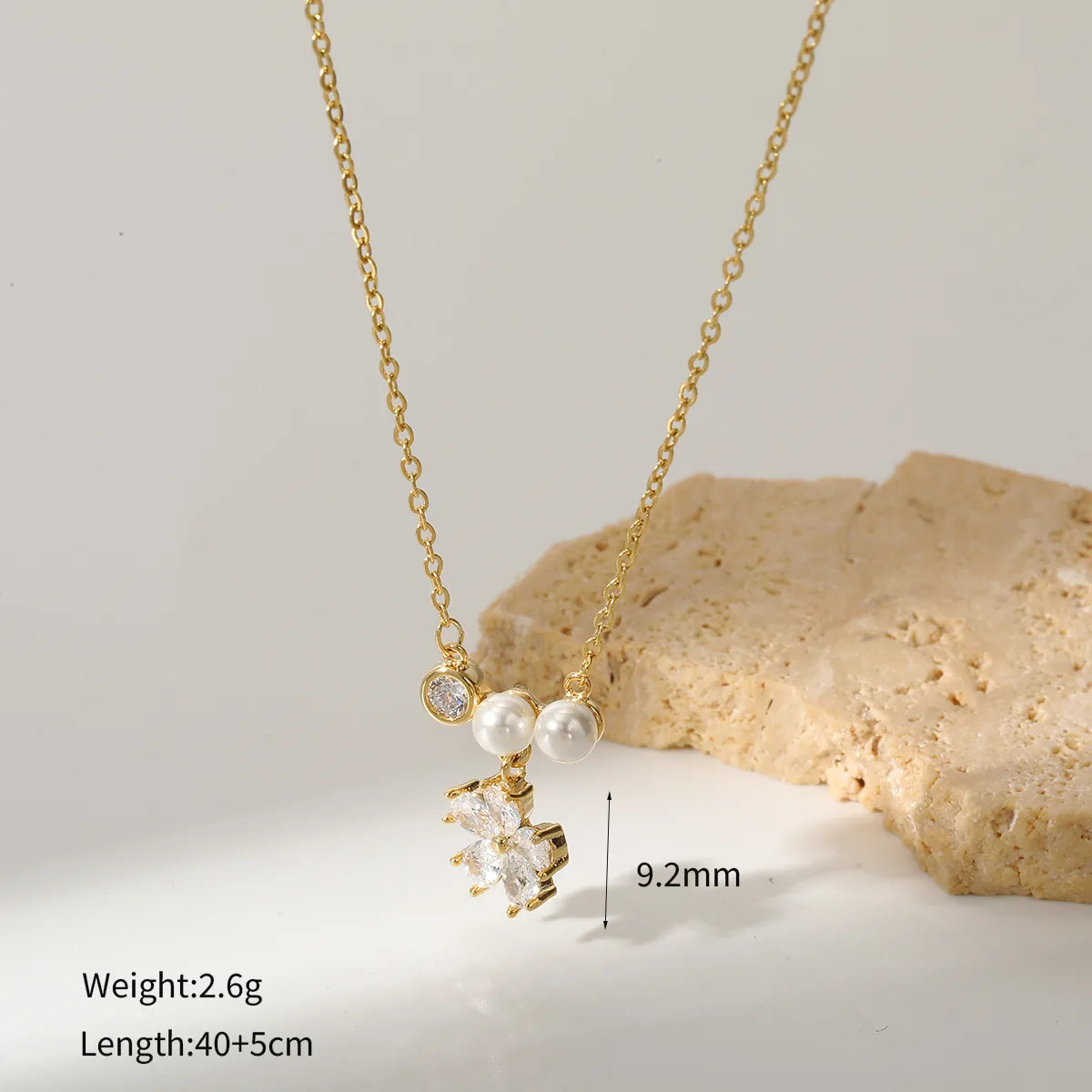 Κολιέ επιχρυσωμένο ατσάλι με λουλούδι και πέρλες-NE401