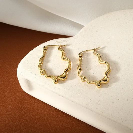 Σκουλαρίκια επιχρυσωμένο ατσάλι κρίκοι λιωμένοι-EA541