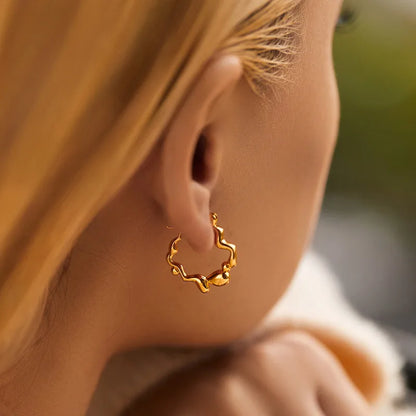 Σκουλαρίκια επιχρυσωμένο ατσάλι κρίκοι λιωμένοι-EA541