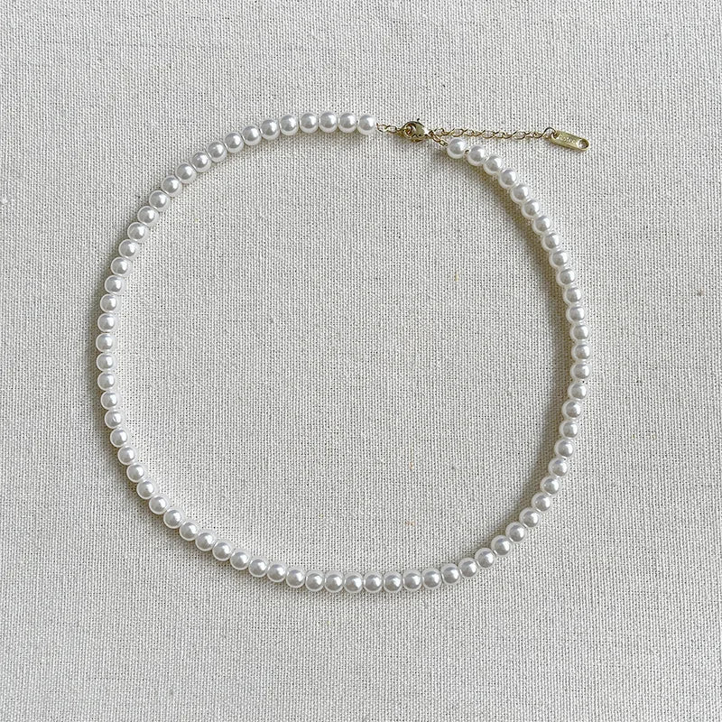 Стальное золотое колье с голубыми цирконами - NE713