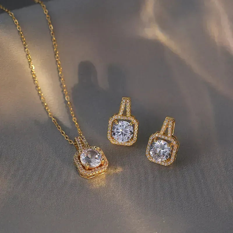 Conjunto de collar y pendientes de oro con circonitas blancas - SET059