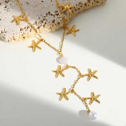 Κολιέ επιχρυσωμένο ατσάλι με αστερίες-NE638