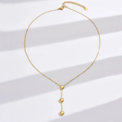 Κολιέ ατσάλινο χρυσό με καρδιές - w595