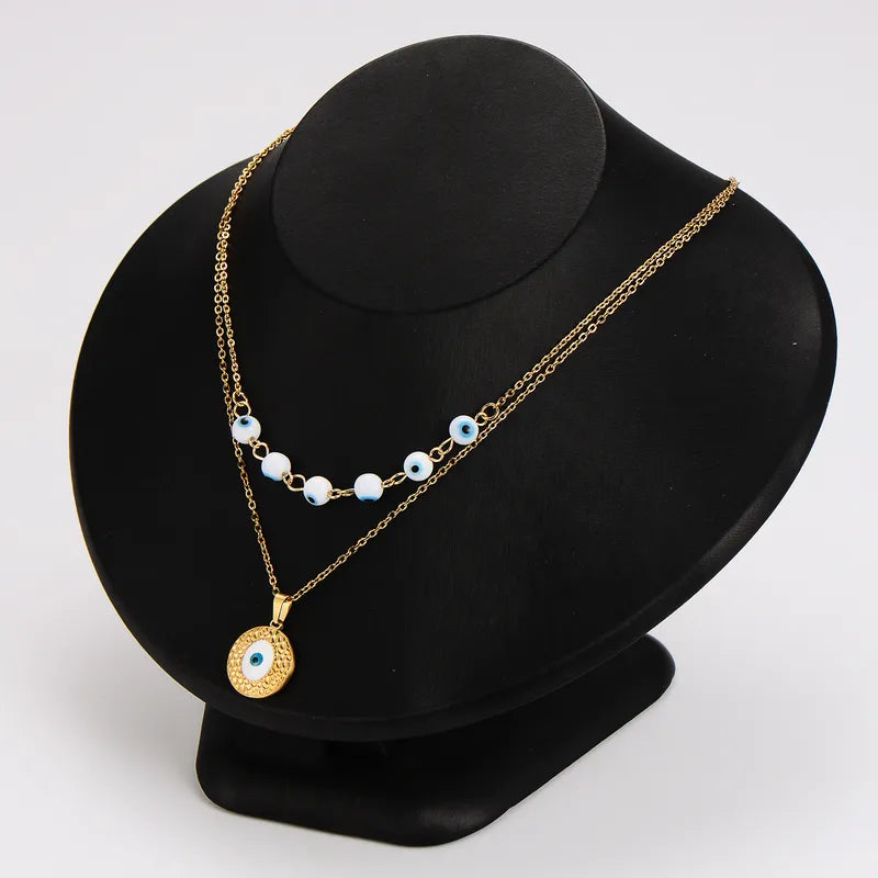 Steel set with necklaces and earrings with blue eyes - SET071