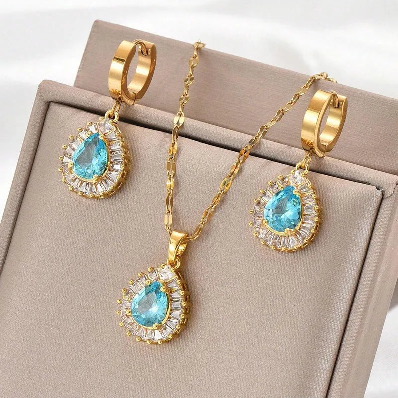 Set of steel and brass with necklaces and earrings with blue stone- SET073