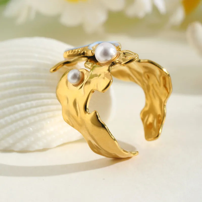 Ring Gilded Steel with Starfish and Pearls