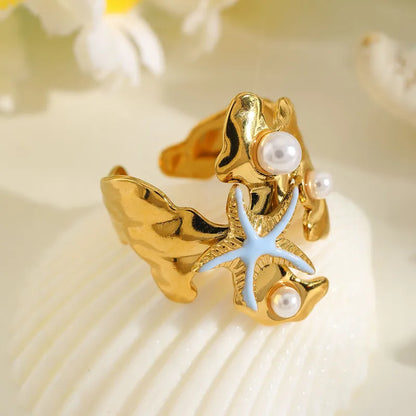 Ring Gilded Steel with Starfish and Pearls