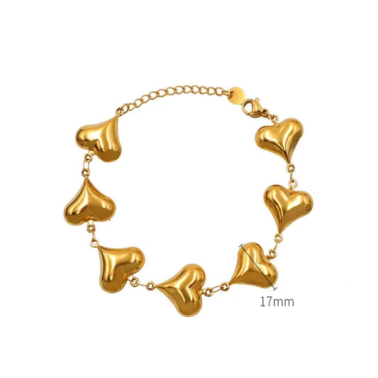 Pulseira em aço dourado com corações-BR136