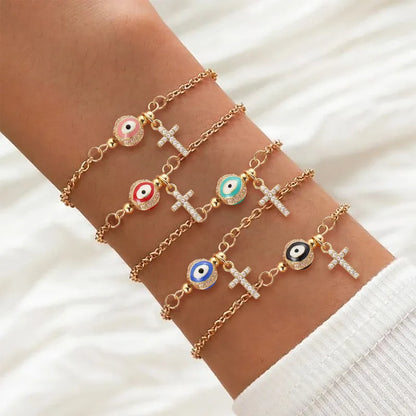 Bracelet gold steel with eye and zircon cross-br234