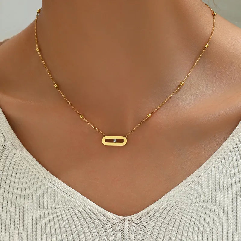 Necklace Tension Gold Steel with Oval and Stone in Center-Ne031