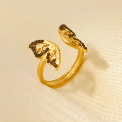 Bague en acier avec papillon et pierres noires - w012