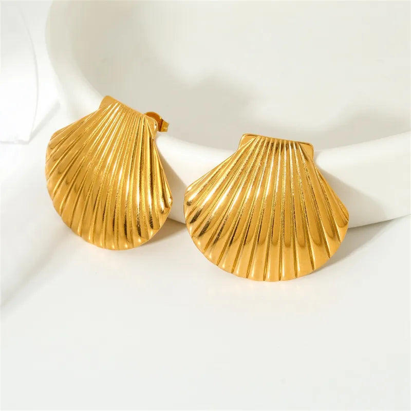 Earrings gold steel whole shells