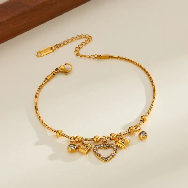 Βραχιόλι επιχρυσωμένο ατσάλι με καρδιά zircon - BR527