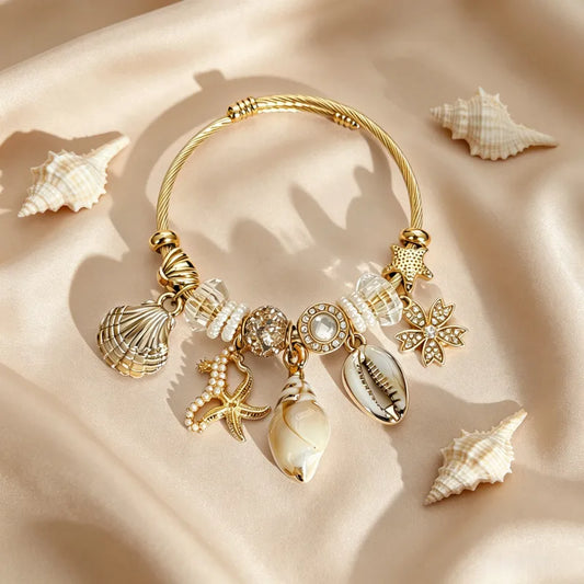 Βραχιόλι ατσάλινο bangle χρυσό με λευκά καλοκαιρινά charms- BR260