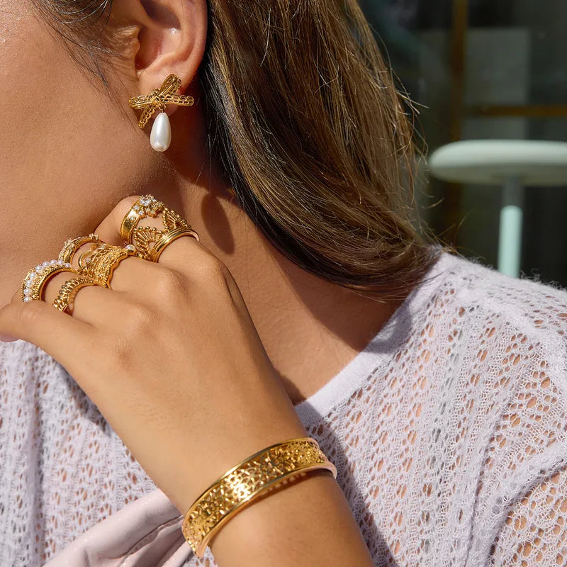 Σκουλαρίκια επιχρυσωμένο ατσάλι με φιόγκο και πέρλες-EA606