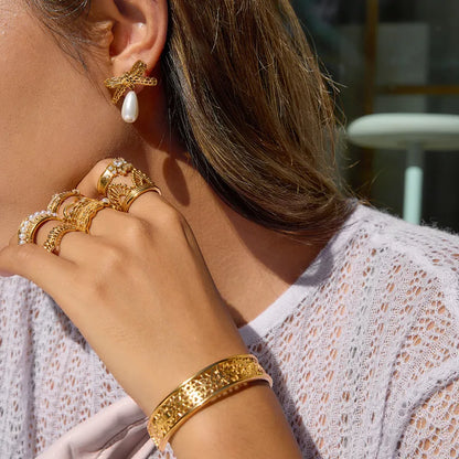 Σκουλαρίκια επιχρυσωμένο ατσάλι με φιόγκο και πέρλες-EA606