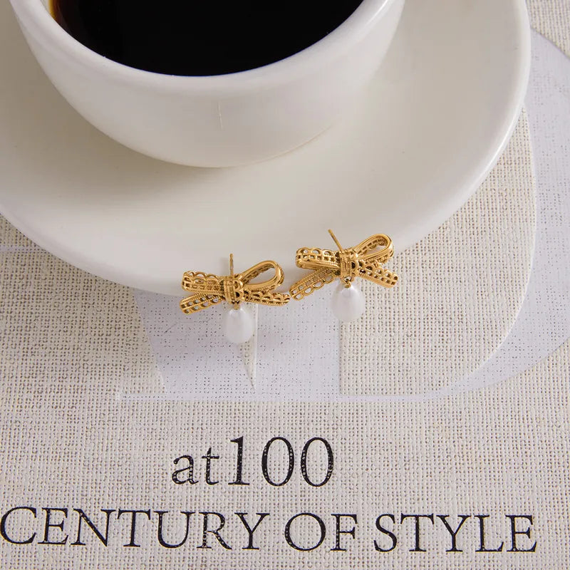 Σκουλαρίκια επιχρυσωμένο ατσάλι με φιόγκο και πέρλες-EA606