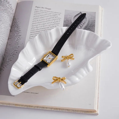 Σκουλαρίκια επιχρυσωμένο ατσάλι με φιόγκο και πέρλες-EA606