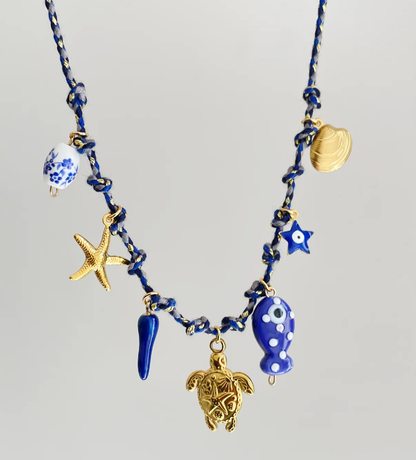 Necklace gold-plated steel with dark blue and sea deco-